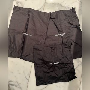 Three saint laurent dust bags